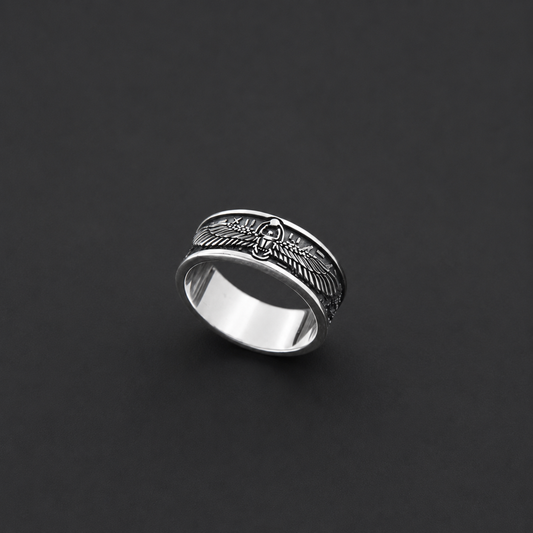 Sterling silver ring with winged scarab motif and Egyptian hieroglyph details
