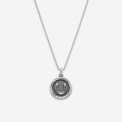 Sterling silver pendant with horseshoe design