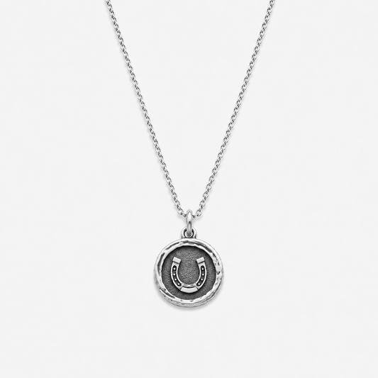 Sterling silver pendant with horseshoe design