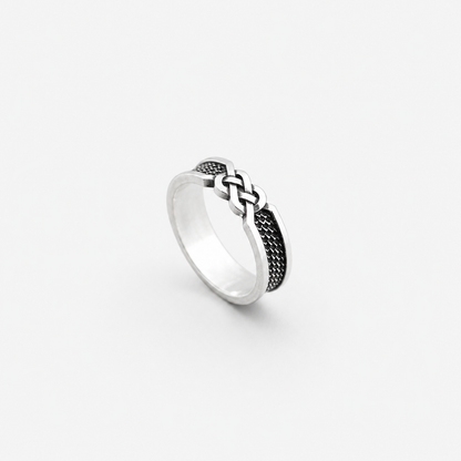 Sterling silver ring with infinity knot design