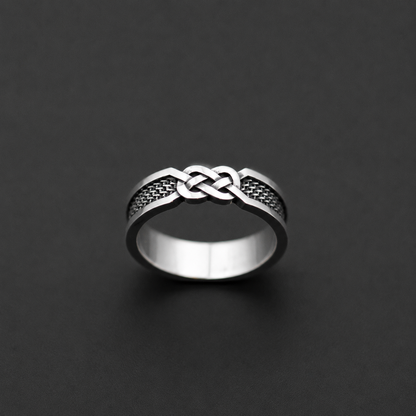 Sterling silver ring with infinity knot design