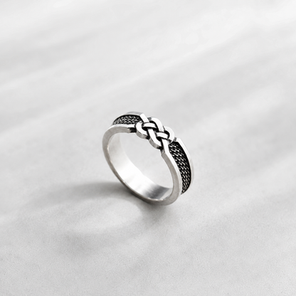 Sterling silver ring with infinity knot design