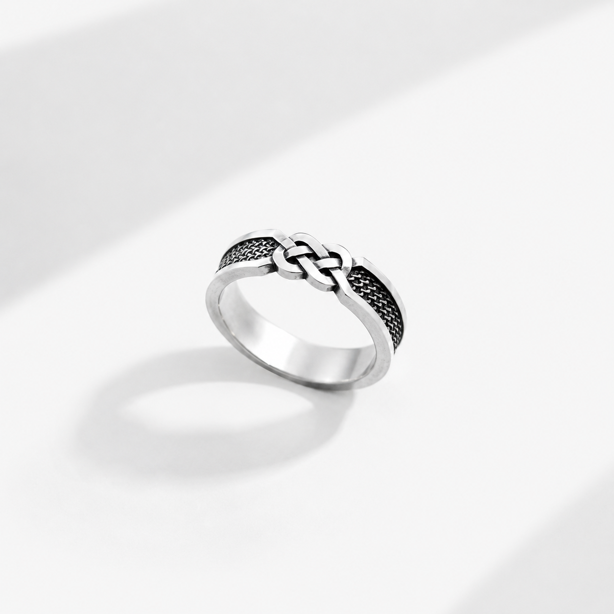 Sterling silver ring with infinity knot design