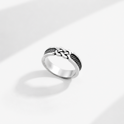 Sterling silver ring with infinity knot design