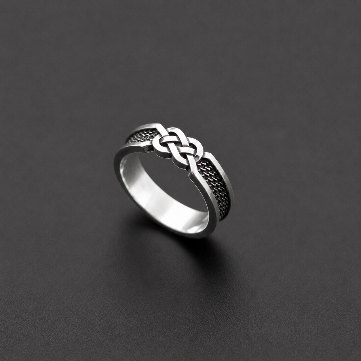 Sterling silver ring with infinity knot design