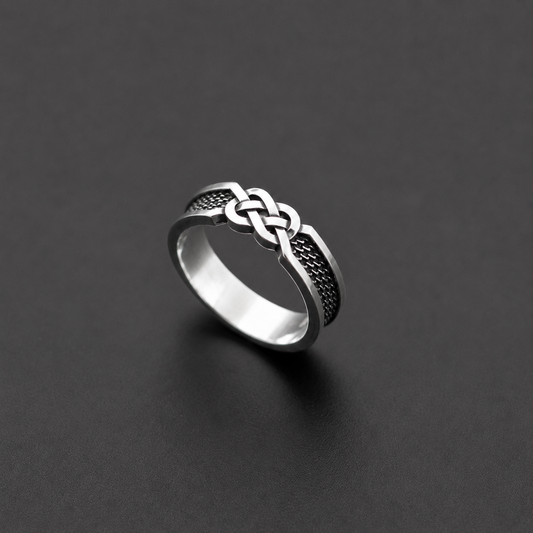 Sterling silver ring with infinity knot design
