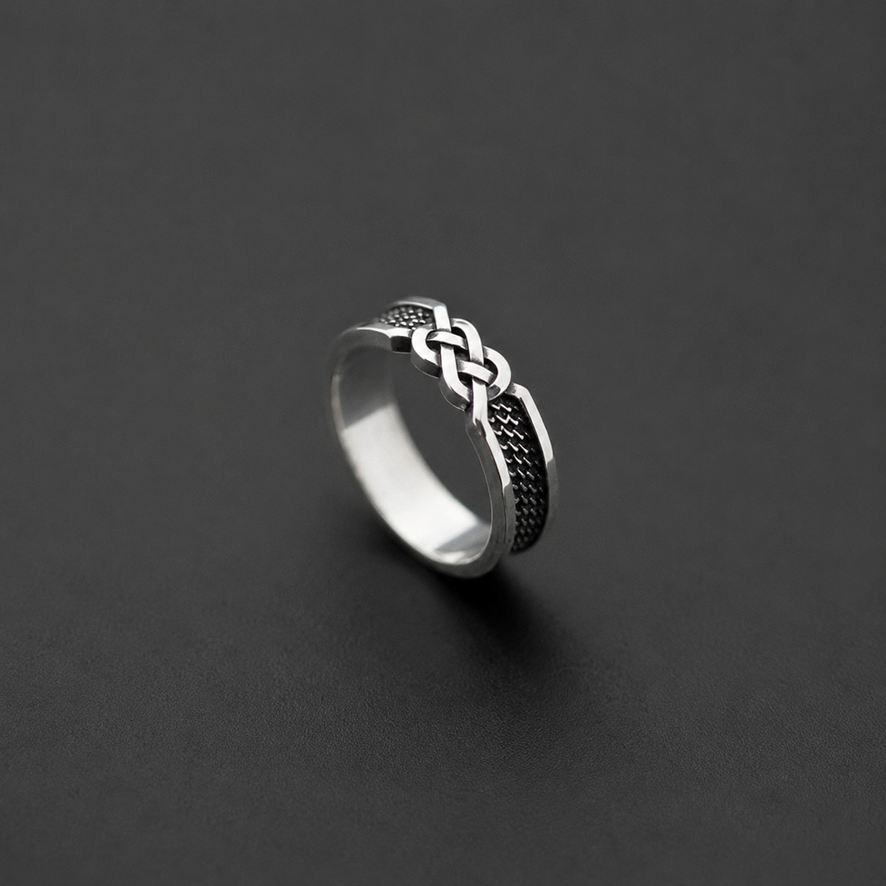 Sterling silver ring with infinity knot design
