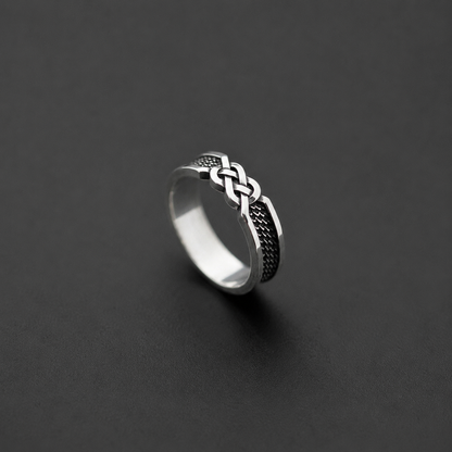 Sterling silver ring with infinity knot design