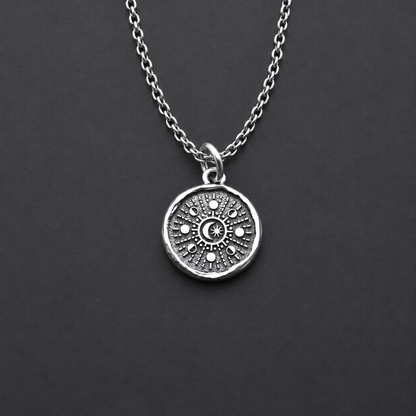 Sterling silver pendant with moon phases design 