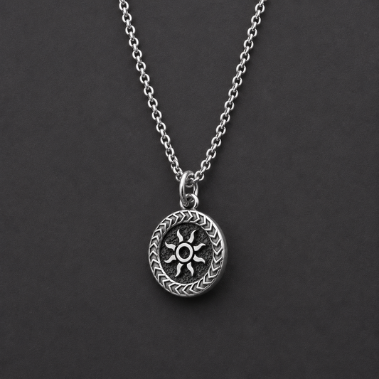 Silver necklace with a sun pendant