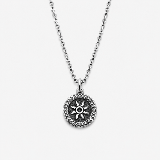 Sterling silver pendant with sun design