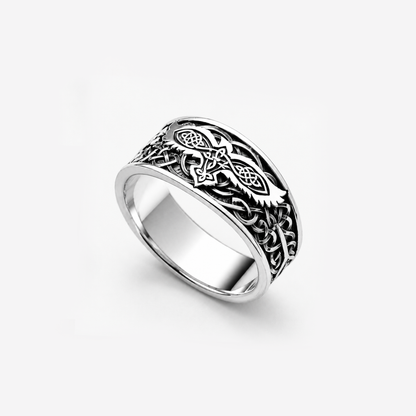 Sterling silver ring featuring a raven motif and Celtic ornament