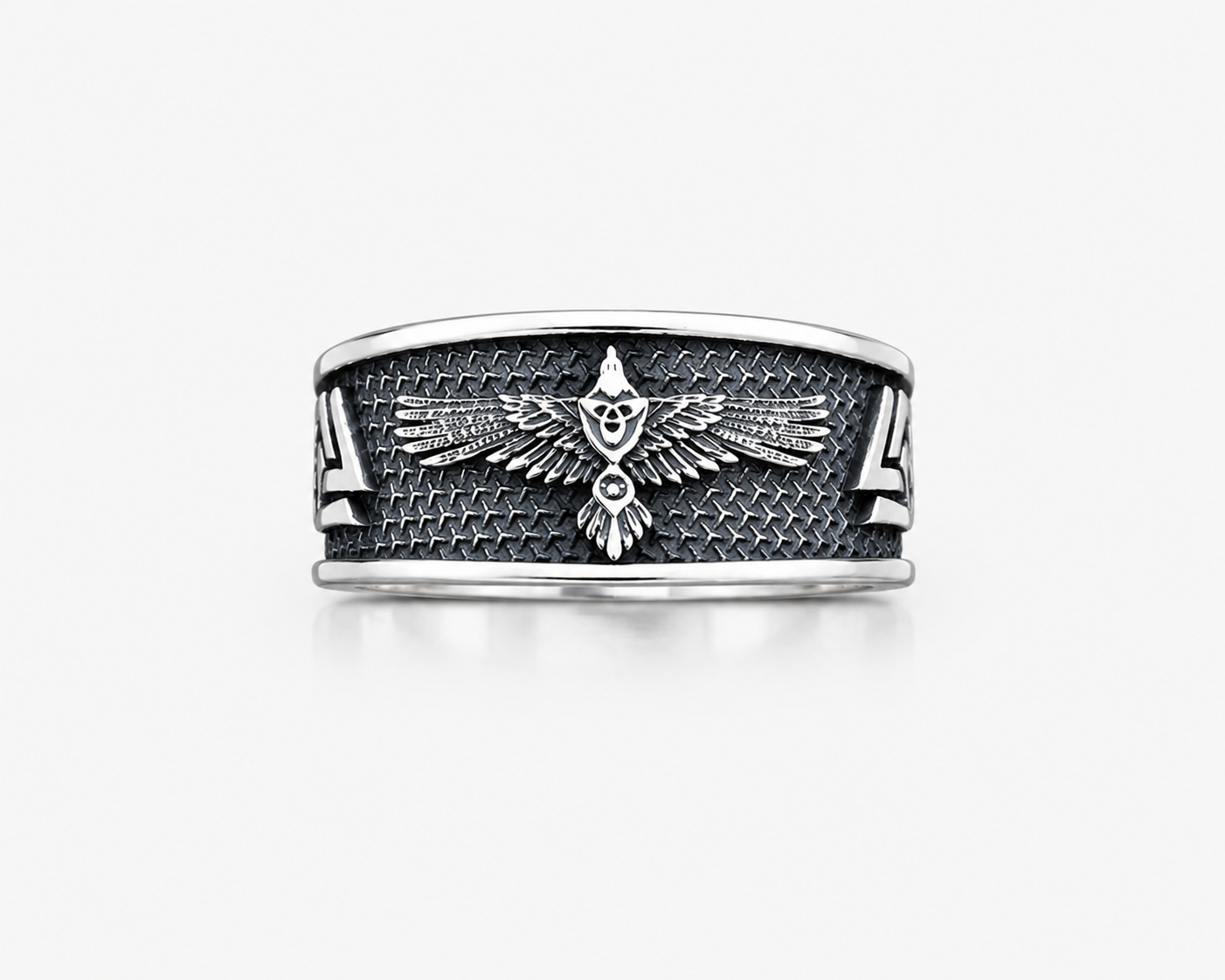 A sterling silver ring with a raven Norse mythology design