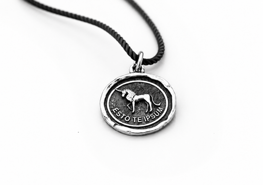 Sterling silver pendant with unicorn design and Esto Te Ipsum inscription